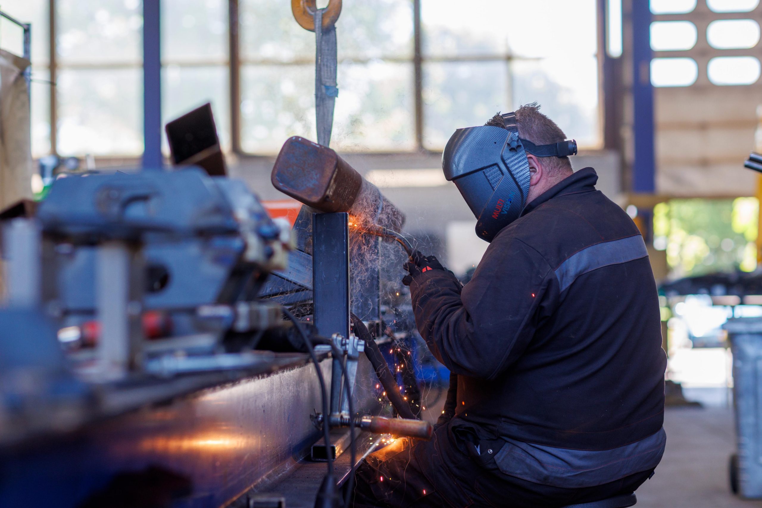 Lasser in werkplaats
